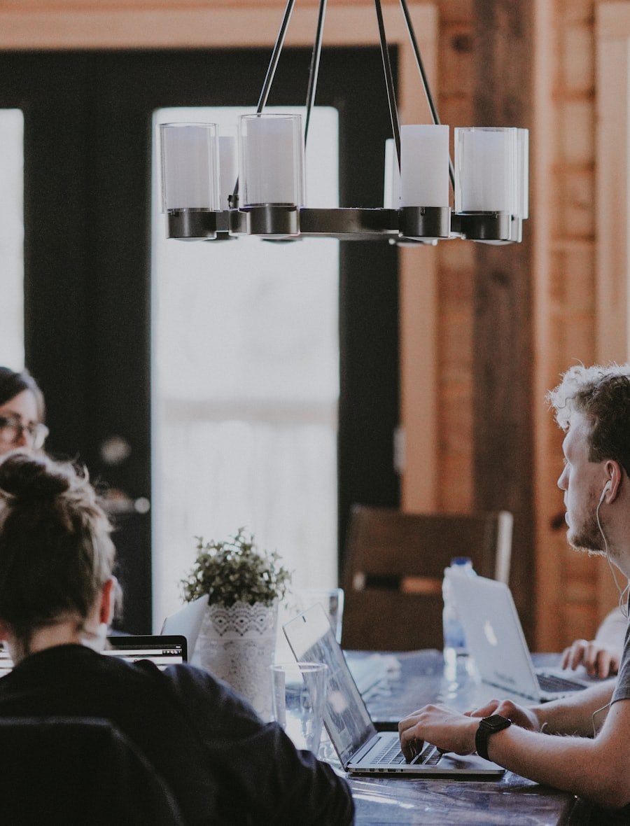 Advisers in discussion around a meeting table