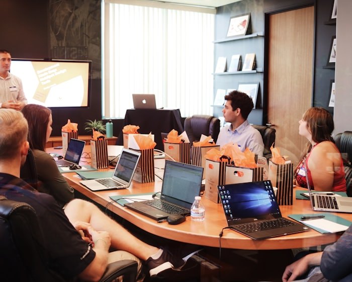 Advisers around a boardroom table
