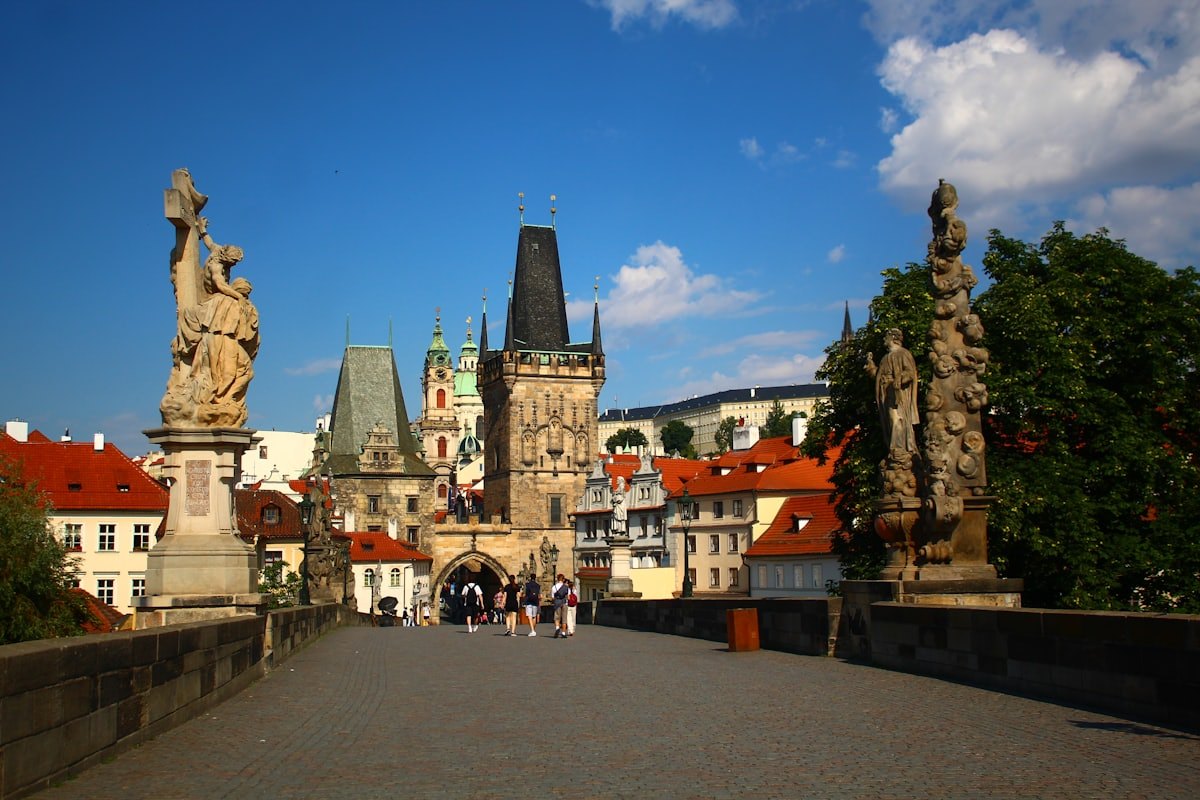 Statues along Charles Bridge towards the bridge tower